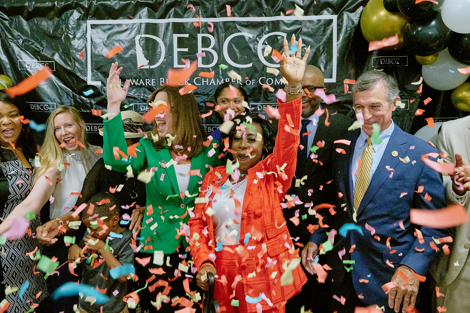 Guests celebrating during a photographed Delaware business event